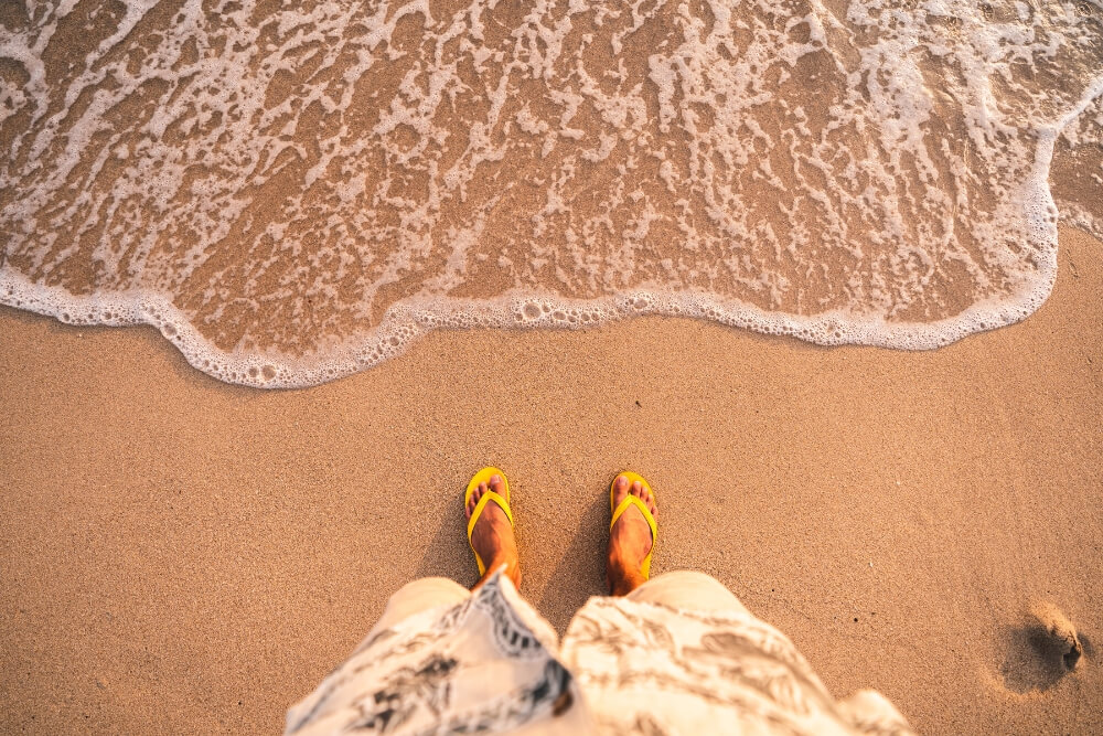 african women wearing Flip-Flops on beach vacation african women wearing Flip-Flops on beach